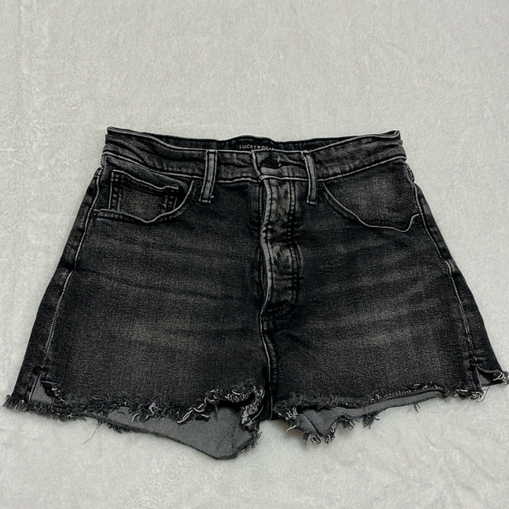 Lucky Brand distressed Mid Rise denim cut off jean shorts size 4/27